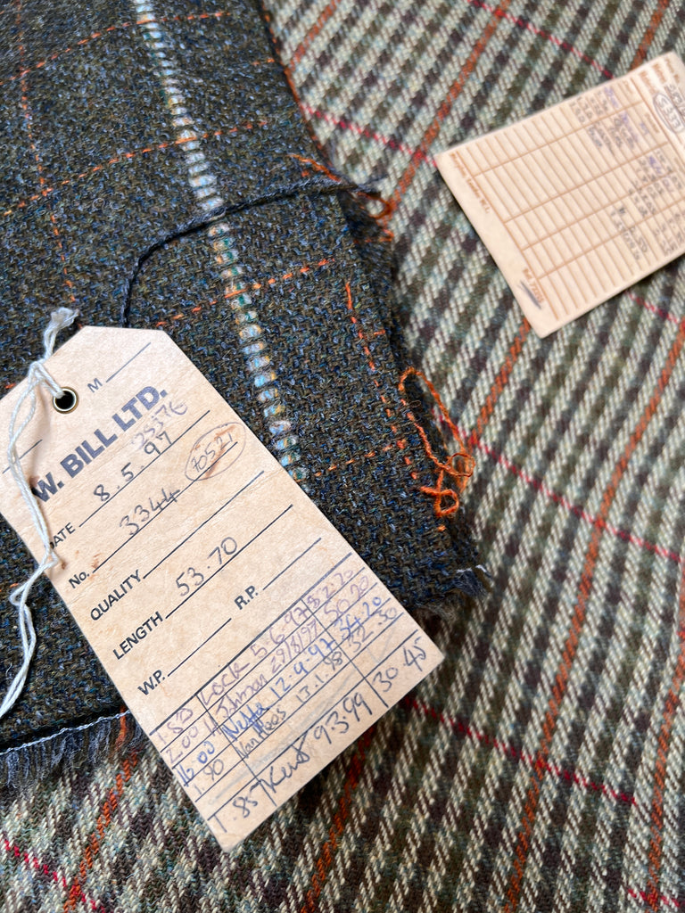 Vintage tweed, light green with red check.