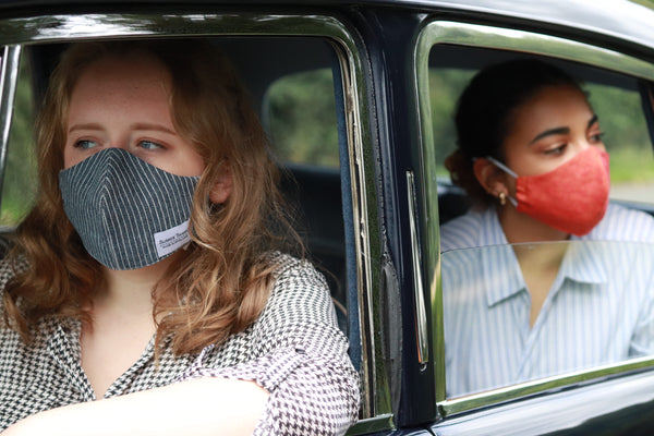 Ladies in a car wearing Washable Face Masks